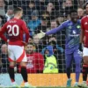 Pemain Manchester United (MU), Harry Maguire, Diogo Dalot, Andre Onana, dan Joshua Zirkzee, tampak lemas setelah gawang tim mereka dibobol Bournemouth dalam laga pekan 17 Premier League 2024/2025 di Old Trafford, Minggu (22/12/2024) malam WIB.